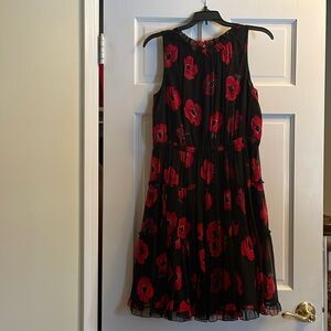 Poppy chiffon Kate Spade mini dress 100% silk and Lining 100% polyester.